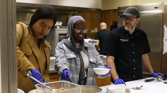 Students and Ryan Solomon Serving at Grinnell Community Meal
